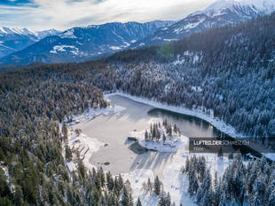 Luftbildaufnahme Caumasee – Winter