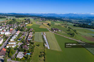 Luftbild Berikon mit Alpen